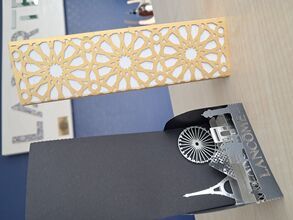 Petite découpe laser dans papier argent et doré